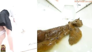 Cheeky ass Japanese milf pooping messy load