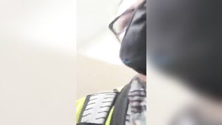 A man with a mask and goggles is looking down at a woman's crotch