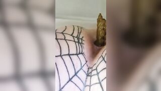 Girl with fishnet stockings poops into a toilet