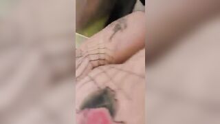 Woman shits on the floor while drawing a spider web on her ass