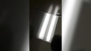 Girl in fishnet stockings lays down on her back