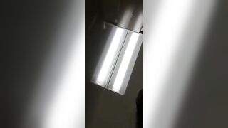 Girl with spiderweb stockings and anal beads takes a shit