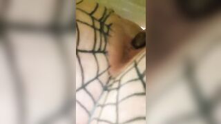 Woman takes a shit on top of a bed