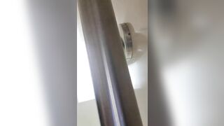 Girl in fishnet stockings with key in her ass