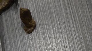 Pushing the poop very hard