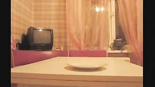 Shitting on a plate in doggy style