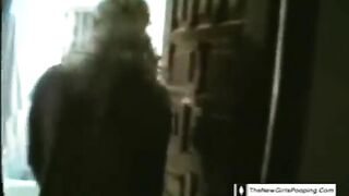 Cute teen girl smearing shit in toilet