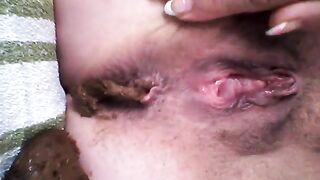 Mature amateur lady pooping on the towel