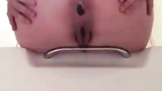 Lovely round ass lady pooping