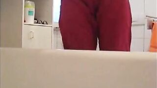 Young brunette milf teasing and pooping in the bathroom