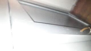 Chick shows off her dildo and butt plug collection on the floor