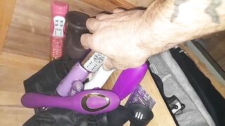 Chick shows off her dildo and butt plug collection on the floor