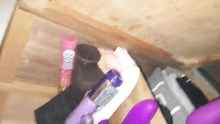 Chick shows off her dildo and butt plug collection on the floor
