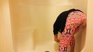 Spreading legs and pooping in the shower