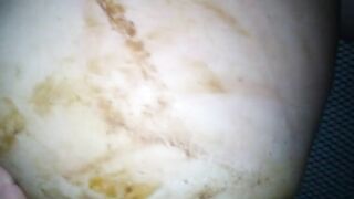 Girl shits in her pants in close up