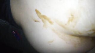 Girl shits in her pants in close up