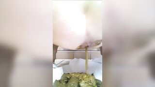 Babe shits on the toilet paper over the toilet seat
