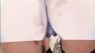 Babe shitting in the bathroom and put her nylon feet