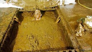 Submerging in cowshit