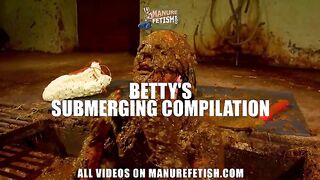 Betty submerging in cowshit