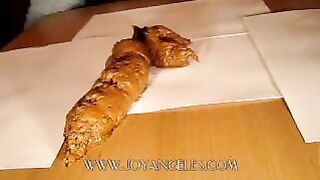 Blue jeans girl drops thick long turd