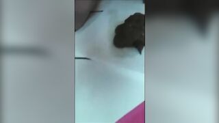 Sexy brunette lady in high heels shitting heavily