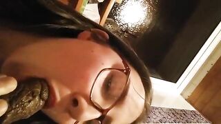 Young lovely brunette girl eating big shit