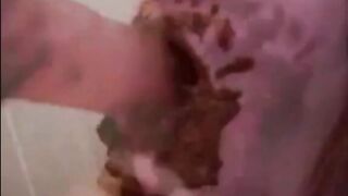 Dirty girl sucking and licking rubber dildo