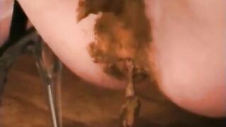 Kinky brunette girl smearing shit on her pussy