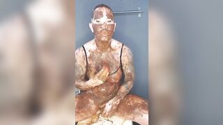 Kinky lady with nice boobs smearing shit heavily