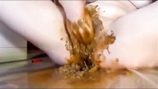 Masturbating and fisting her pussy