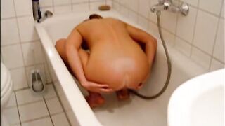 Enema and poop in the bathtub