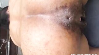 Hairy woman shitting doggy closeup