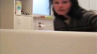 Hot butt brunette shitting in bathtub