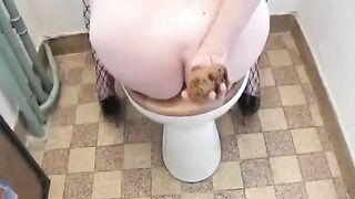 Lady in fishnets farting and pooping