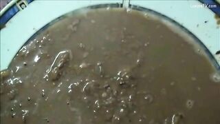 Mature lady poops in the plate