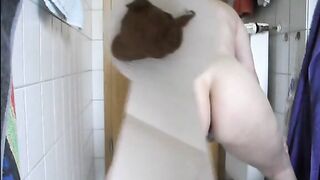 Mature lady shitting hard in the bathroom