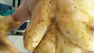 Mature woman smearing shit on her boobs