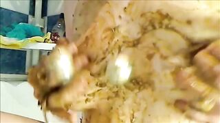 Mature woman smearing shit on her boobs