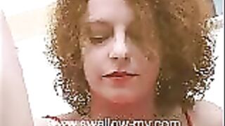 Redhead milf takes shit on her hand