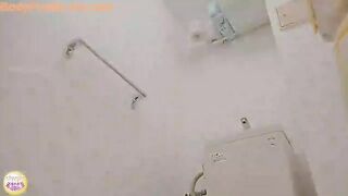 Chubby brunette in pantyhose caught pooping