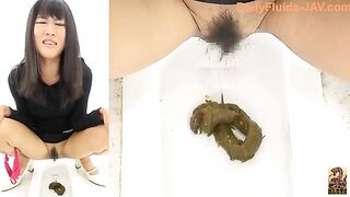 Pretty japanese shitting while showing her hairy pussy