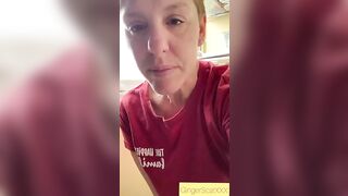 Relieving herself at home