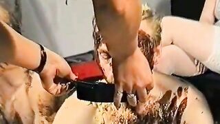 Kinky milfs gets covered in the shit