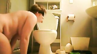 Hairy mature slut shitting