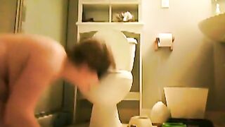 Hairy mature slut shitting