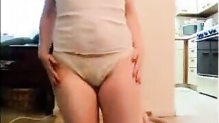 Curvy blonde with nice tits and ass shitting on panty