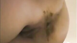 Milf is shoving her pulsating asshole