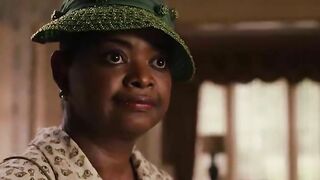 Woman pisses in a sink while wearing a hat