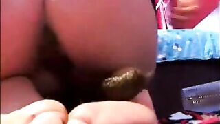 Round booty girl shitting on her feet